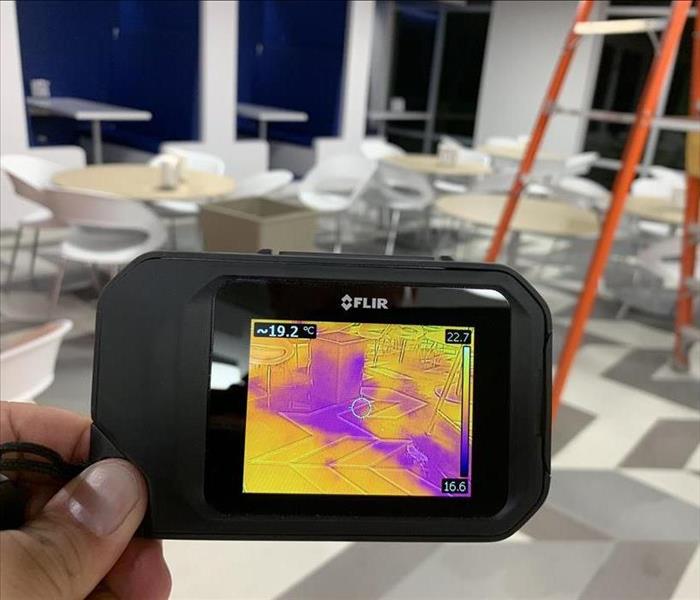 Thermal imaging camera showing a reading.
